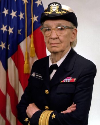 image provided James S. Davis/the United States Navy via Wikimedia Commons https://commons.wikimedia.org/wiki/File:Commodore_Grace_M._Hopper,_USN_(covered).jpg